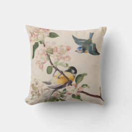 Almofada Dois pequenos pássaros perto de um galho de flores