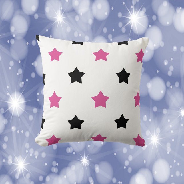 Almofada Estrelas - Preto e Cor-de-Rosa - Branco (A throw pillow with a pattern of pink and black stars.)