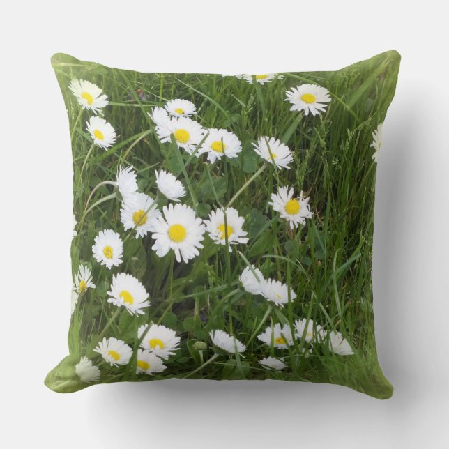 Almofada flor grande brilhante em frente ao fundo verde (Frente)