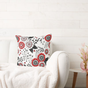 Almofada Flores e folhas de rabo em vermelho e preto