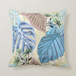 Almofada Folhas tropicais azuis e roxas.