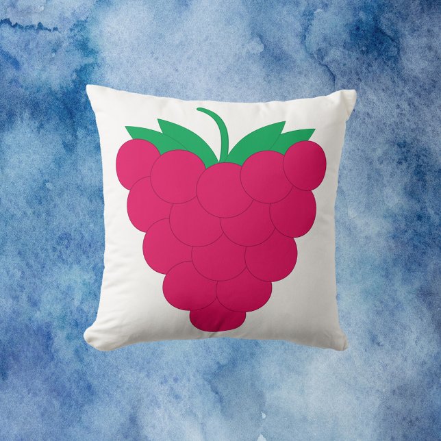 Almofada Fruta Rosa Framboesa  (A throw pillow with a graphic of a pink raspberry with a green stem.)