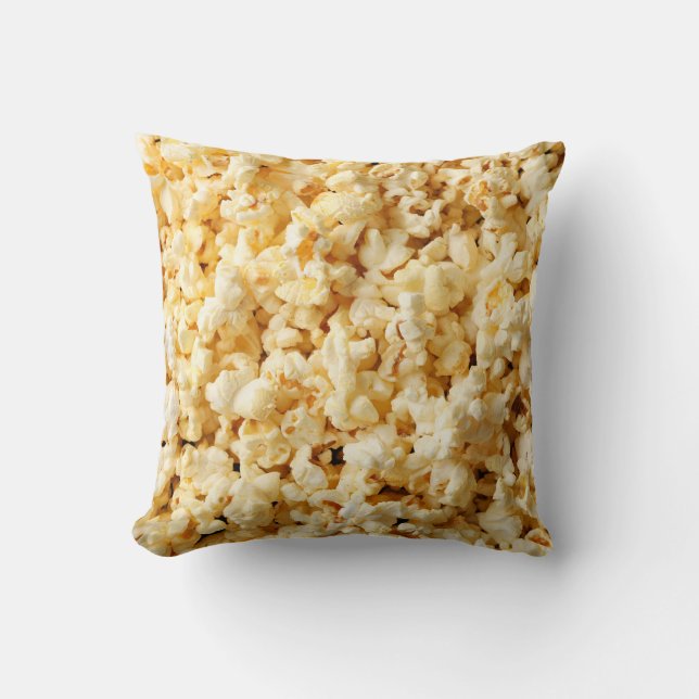 Almofada Fundo do Cheio de pipoca em cinema. (Frente)