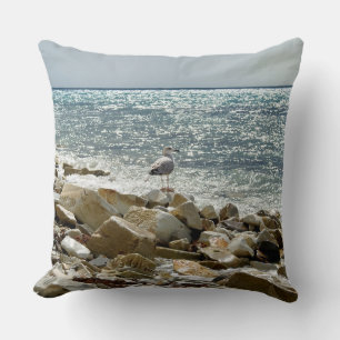 Almofada gaivota e surf do mar