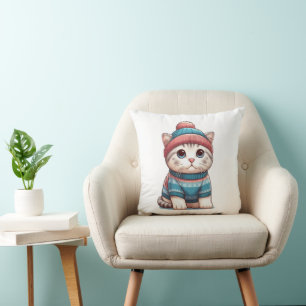 Almofada Gato giro em um suéter e beanie