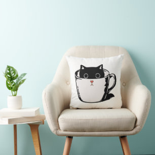 Almofada Gato preto com nariz vermelho escondido em um copo