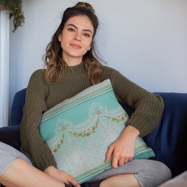 Almofada Guirlandas de Rosas com Laços e Nós de Fitas Decor (mockup of a woman holding a Roses Garlands Lacy Swags Bow Knots Homedecor Throw Pillow)