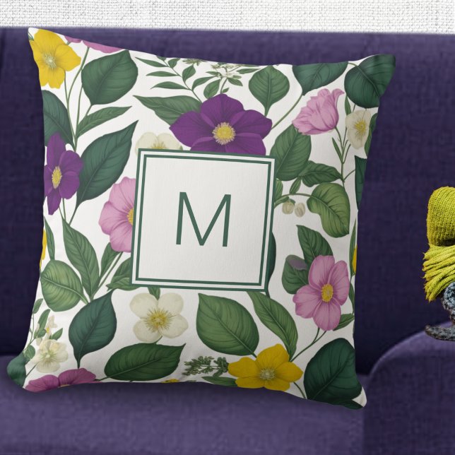 Almofada Lindo Impresso Floral Elegante Flores da Primavera (A pretty monogrammed cushion with purple, pink, yellow and white flowers and green leaves)