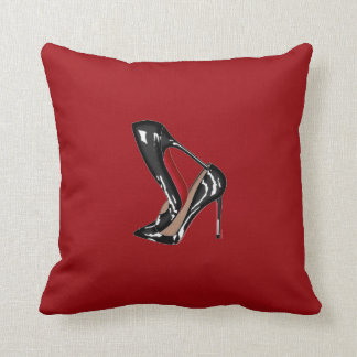 Almofada LOUBOUTIN EMPILHADO com fundo VERMELHO