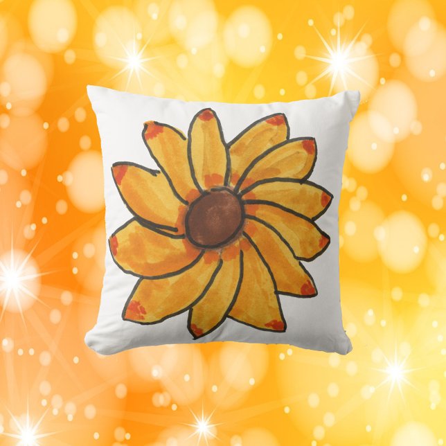 Almofada Mão Amarelo de Girassol Desenhada (A throw pillow with a hand drawn yellow flower.)