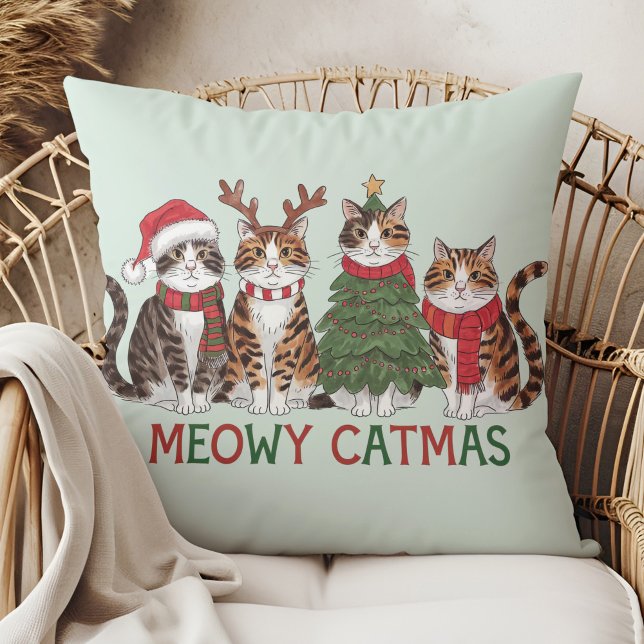 Almofada Meowy Catmas Funny Holiday Cats - Christmas Decor  (Meowy Catmas Funny Holiday Cats - Christmas Decor Throw Pillow in a boho rattan armchair.)