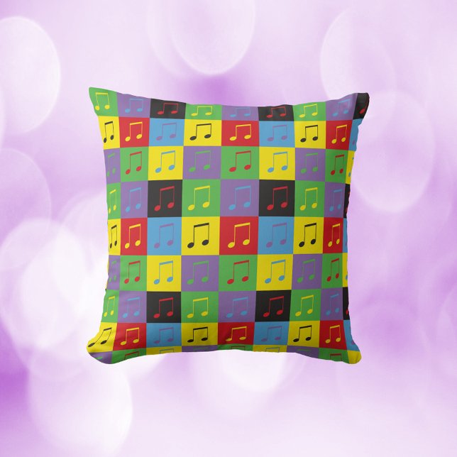 Almofada Music Notes - Padrão de Arte Pop (A throw pillow with a pop art music note pattern)