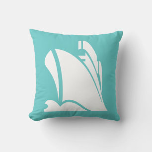 Almofada navio branco no travesseiro azul teal