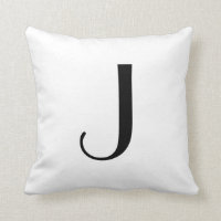 O monograma descansa a letra J