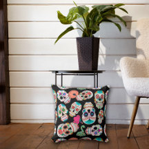 Padrões coloridos de crânios de açúcar em preto