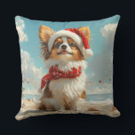 Almofada Papillon Dog Christmas Vintage Beach<br><div class="desc">Traga o calor dos feriados para a costa com esta charmosa design inspirada na vintagem, que apresenta um cão festivo sentado numa praia serena. Com um clássico toque de feriado de tons nostálgicos e vibrações costeiras, esta trabalho de arte captura a magia do Natal pelo mar. Perfeito para espalhar alegria...</div>