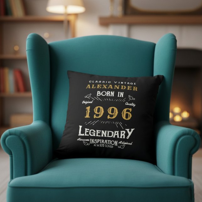 Almofada Personalized 30th Birthday Born 1996 Legend Black (Born 1996 throw pillow on a green chair.)