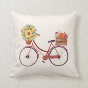 Almofada Queda. Bike Vermelha Vintage com Pumpkins e Girass
