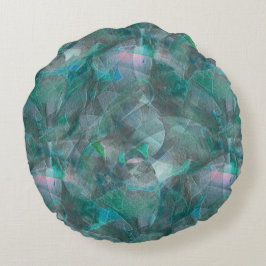 Almofada Redonda Cinza esverdeado sobre gesso de parede inacabado