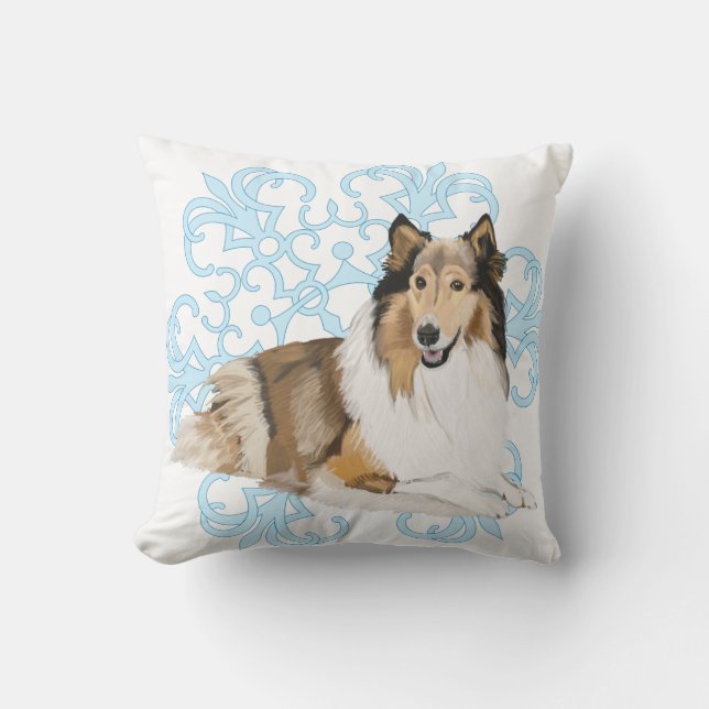 Almofada Rough Collie sobre um fundo azul de neve (Frente)