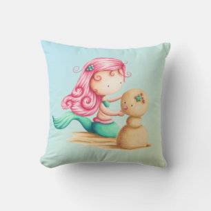 Almofada Sereia Fria com cabelo cor-de-rosa brincando com a