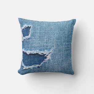 Almofada Textura do tecido denim rasgada, matizes azuis.
