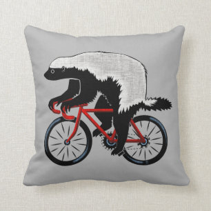Almofada Texugo de mel em uma bicicleta
