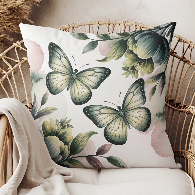 Almofada Travesseiro Decorativo Borboleta Verde Salvia (Sage Green Butterfly Throw Pillow in a boho neutral rattan armchair)