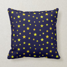 travesseiro decorativo com estrelas no fundo azul