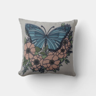 Almofada Travesseiro floral de creme de borboleta azul para