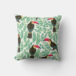 Almofada Tucanos, folhas tropicais, padrão decorativo.