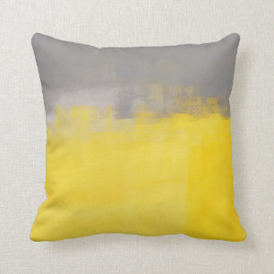 Almofada "" Um travesseiro cinzento e amarelo abstrato