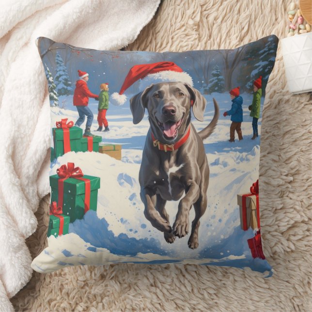 Almofada Weimaraner correndo em neve com chapéu de Natal (Cobertor)