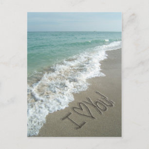 Amo-te, Sand Escrevendo no cartão de Posto Praia