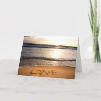 Amor no cartão da praia
