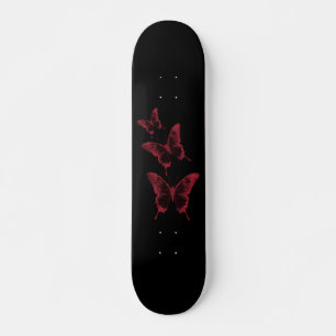 Andar de skate de borboletas preto e vermelho