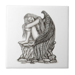 Anjo dormindo na pedra