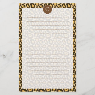 Artigos de papelaria alinhados do leopardo do