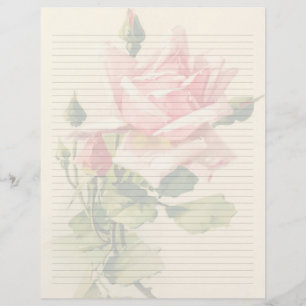 Artigos de papelaria alinhados florais do