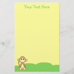 Artigos de papelaria do amarelo do macaco do bebê