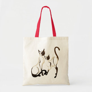 As duas bolsas dos gatos Siamese