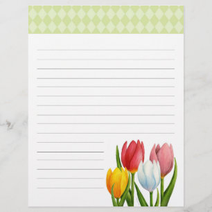 As tulipas do primavera alinharam o cabeçalho