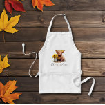 Avental Highland Cow Sunflower Balde<br><div class="desc">Aproveite o charme do nosso avental da cozinha do Balde Sunflower Cow Highland! Não se esqueça de personalizar com seu próprio nome. Faz um presente de excelente também! E não perca a exploração do resto da nossa Vaca da Terra Alta Bebê com coleção de Baldes de girassol para opções ainda...</div>