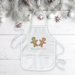 Avental Infantil Biscoitos de pão-de-gengibre<br><div class="desc">Um avental de Natal para Crianças com dois biscoitos de gengibre brancos em matizes verdes e cor-de-rosa feliz. Estes doces companheiros inspiram criatividade e alegria em todas as aventuras festas!</div>