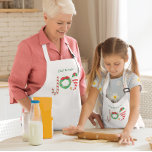 Avental Infantil Joy Natal<br><div class="desc">Personalize este avental encantador com o nome do seu Elf de Natal favorito para uma família divertida de assar!</div>
