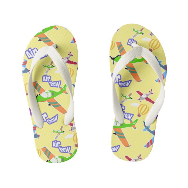 Avião mostra Chinelos de Criança Amarela (Pé da cama)