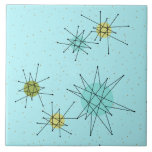 Azulejo atômico azul de Starbursts do ovo do pisco<br><div class="desc">O teste padrão atômico icónico azul do azulejo de Starbursts do ovo deste pisco de peito vermelho caracteriza starbursts atômicos icónicos. Isso é direito! A velha escola, fundo colorido azul do ovo do pisco de peito vermelho com salpicos do ouro é o contexto perfeito para a turquesa vibrante, o aipo...</div>