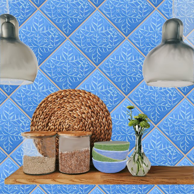 Azulejo cerâmico com Folhas de Ovato Estilizadas A (Blue ovate leaf tile shown on a kitchen backsplash.)