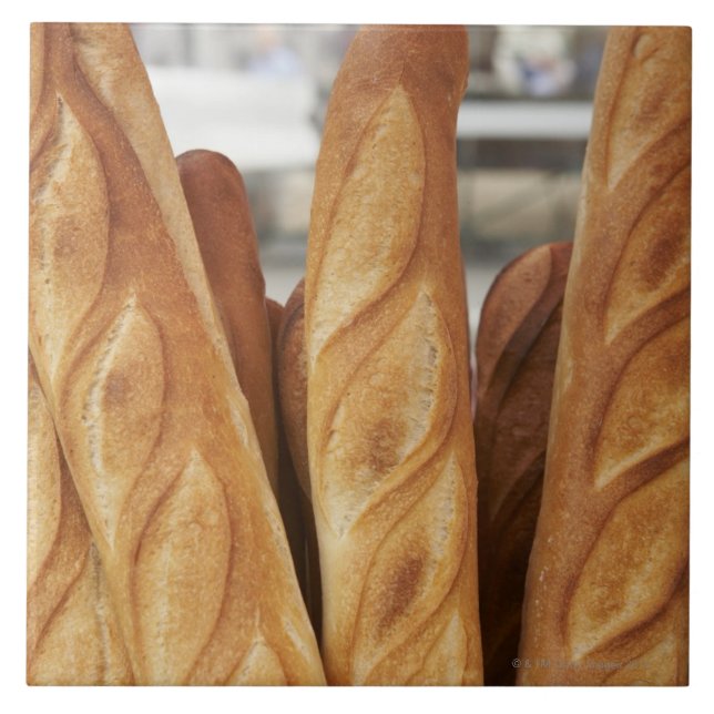 Baguettes frescos, quentes (Frente)