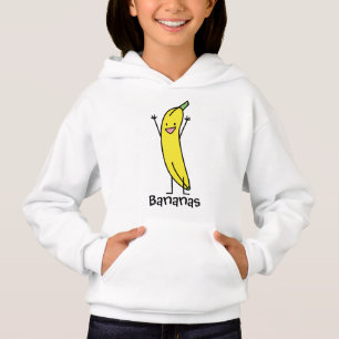 Banana que é de sorriso, estabelecendo e relaxand